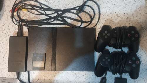 Playstation 2 Slim and 2 x Original Dualshock 2 Controllers