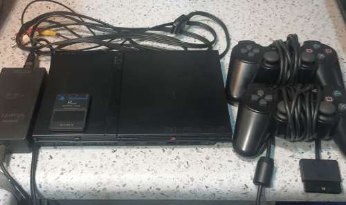 Playstation 2 Slim and 2 x Original Dualshock 2 Controllers