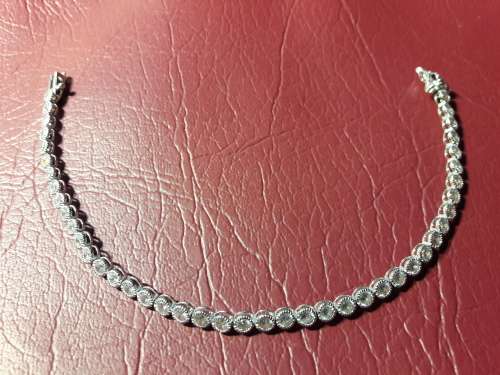 LOVELY SOLID GENUINE STERLING SILVER TENNIS BRACELET IN PRISTINE CONDITION