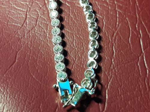 LOVELY SOLID GENUINE STERLING SILVER TENNIS BRACELET IN PRISTINE CONDITION