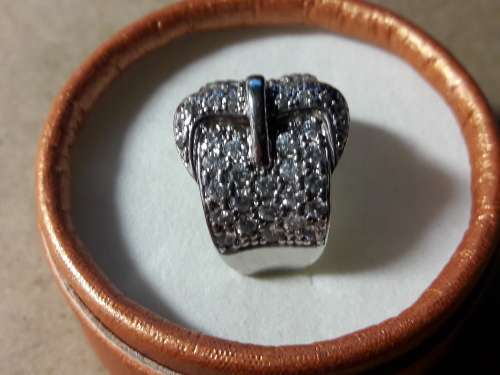 LOVELY SOLID GENUINE STERLING SILVER RING IN EXCELLENT CONDITION.