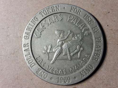 1969 ONE DOLLAR GAMING TOKEN CAESARS PALACE LAS VEGAS