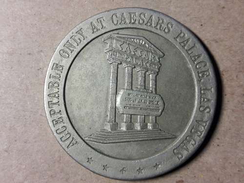 1969 ONE DOLLAR GAMING TOKEN CAESARS PALACE LAS VEGAS