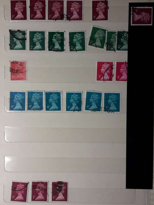 STAMP ALBUM WITH 230 STAMPS