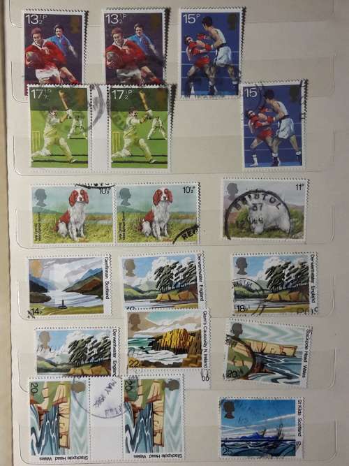 STAMP ALBUM WITH 230 STAMPS