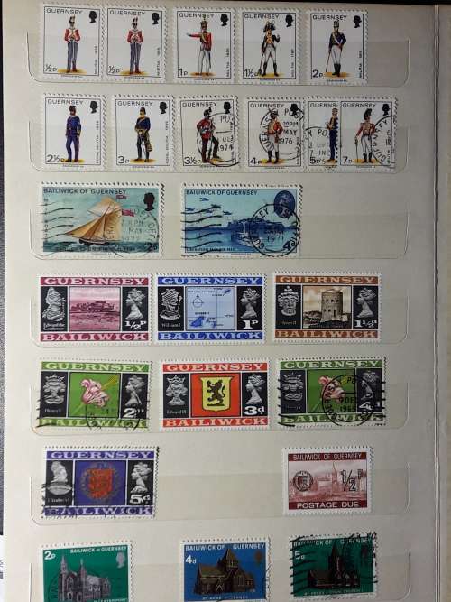 STAMP ALBUM WITH 230 STAMPS