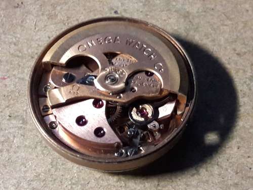 OMEGA MOVEMENT THAT WAS TAKEN OUT OF SOLID GOLD CASING [Was in working condition before taken out]