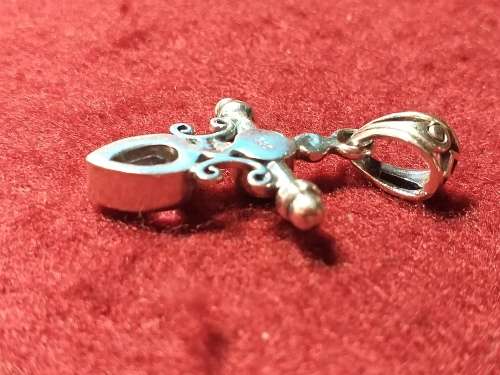 LOVELY SOLID GENUINE STERLING SILVER PENDANT WITH STONES IN EXCELLENT CONDITION.