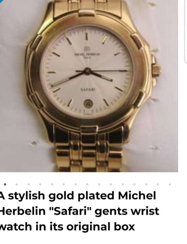A STYLISH GOLD PLATED MICHEL HERBELIN "SAFARI" GENTS WRIST WATCH IN BOX. EXCELLENT CONDITION