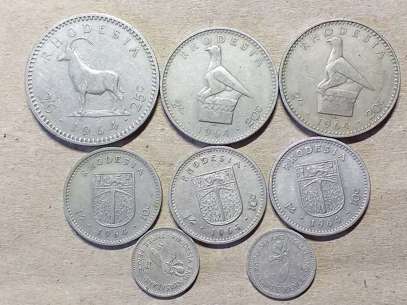 A LOT OF 8 RHODESIA COINS