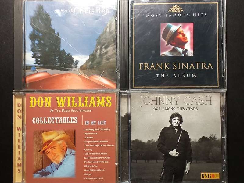 4 CD's IN ORIGINAL CASINGS [Bid per CD to take all]