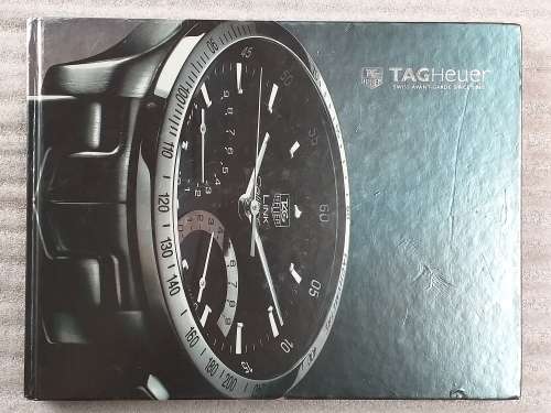 TAG HEUER BOOK 127 PAGES HARD COVER WITH COLOUR FOTO`S ON EACH PAGE IN EXCELLENT CONDITION - RARE