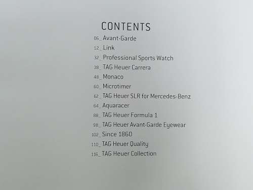 TAG HEUER BOOK 127 PAGES HARD COVER WITH COLOUR FOTO`S ON EACH PAGE IN EXCELLENT CONDITION - RARE