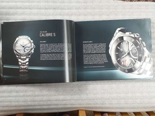 TAG HEUER BOOK 127 PAGES HARD COVER WITH COLOUR FOTO`S ON EACH PAGE IN EXCELLENT CONDITION - RARE