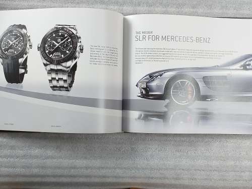 TAG HEUER BOOK 127 PAGES HARD COVER WITH COLOUR FOTO`S ON EACH PAGE IN EXCELLENT CONDITION - RARE