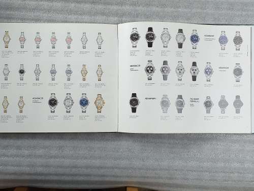 TAG HEUER BOOK 127 PAGES HARD COVER WITH COLOUR FOTO`S ON EACH PAGE IN EXCELLENT CONDITION - RARE