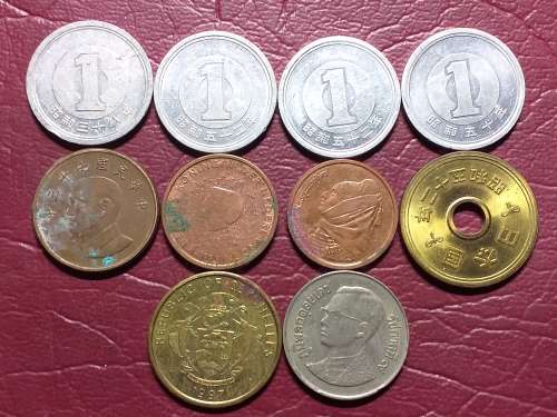 A LOT OF 10 INTERNATIONAL COINS - [One bid for the lot.]
