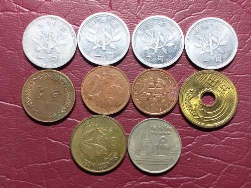 A LOT OF 10 INTERNATIONAL COINS - [One bid for the lot.]