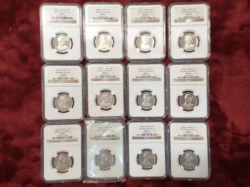 A SET OF 12 x 2000 RSA R5 COINS - MANDELA - NGC GRADED XF 40 TO MS 66 - IN PLASTIC BOX - RARE GRADES