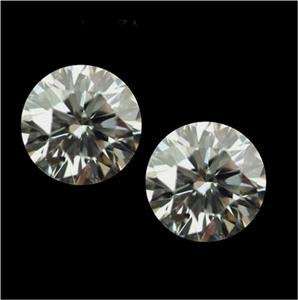 0.55cts pair of matching Brilliant Round Natural Diamonds â Light Champagne â VS2