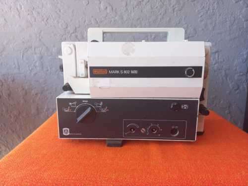 VINTAGE PROJECTORS IN GOOD COMPLETE CONDITION (bid per projector to take all