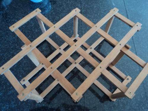 AWESOME!!!!!! FOLDABLE WOODEN WINE RACK!!!!!! HOLDS 8 BOTTLES!!!!