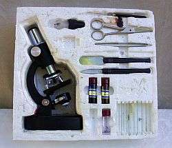 A vintage microscope set