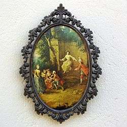 A CHARMING VINTAGE METAL FRAME WITH A SPLENDID HISTORIC SCENE