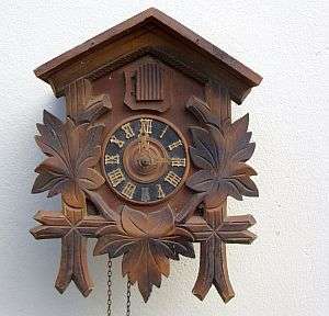 A VINTAGE GERMAN CUCKOO CLOCK