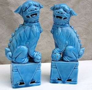 A PAIR OF FOO DOGS - CHINESE GUARDIANS - STAMPED