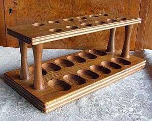 CHEAPER BY THE DOZEN - A VINTAGE GENUINE WALNUT TWELVE SLOT PIPE RACK