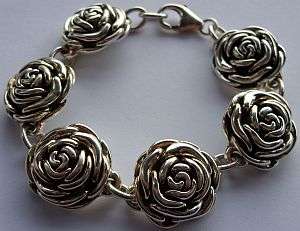 SUPERB FLOWER SHAPED STERLING SILVER BRACELET