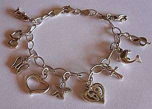 PLEASING CHARM BRACELET MADE OF STERLING SILVER