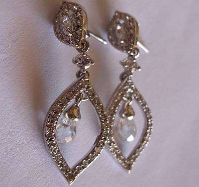 REMARKABLE STERLING SILVER EARRINGS WITH DANGLING CZ STONE BALLS