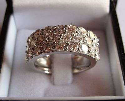 LIKE NEW !! GORGEOUS STERLING SILVER BLING RING WITH LOTS OF FACETED CZ STONES