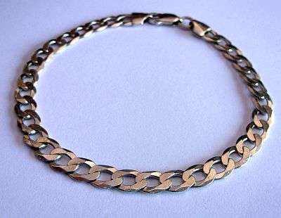 A TASTEFUL STERLING SILVER GENTS BRACELET