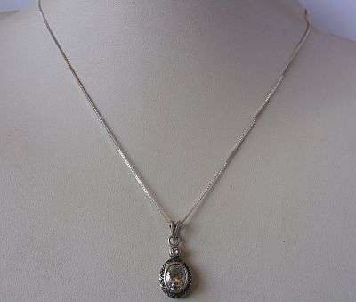 A CLASSY STERLING SILVER NECKLACE WITH A FACETED CZ SET STERLING SILVER PENDANT !!! SWEET !!!!