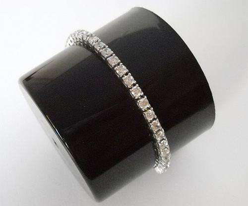 A GORGEOUS STERLING SILVER TENNIS BRACELET SET WITH FACETED CZ STONES !!!