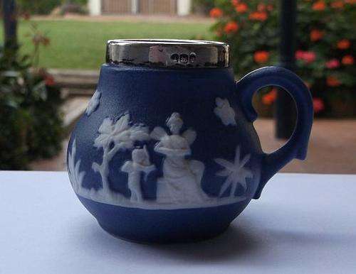 AN ADORABLE ANTIQUE JASPER WARE JUG WITH LONDON HALLMARKED STERLING SILVER RIM ...WOW !!!