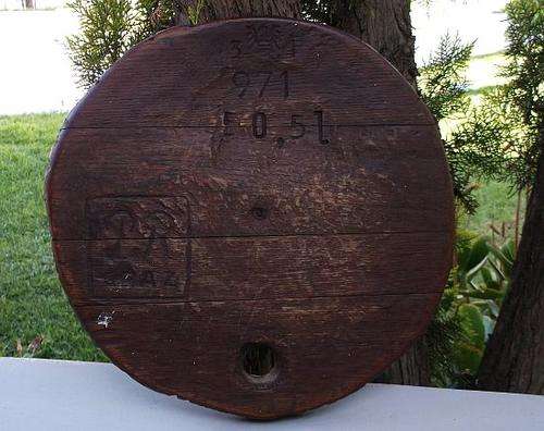 WOW !! A VERY OLD WINE VAT LID FROM THE FARM ....LOOKS LIKE GERMAN STAMPS ...FOR THE BAR OR MAN CAVE