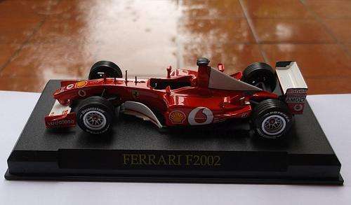 1:43 FERRARI F2002 DIE CAST METAL MODEL ON STAND ...AWESOME DETAILS..VODAFONE / SHELL ADVERTISING !!