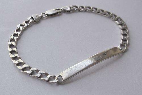 AN EXCEPTIONAL QUALITY SOLID STERLING SILVER IDENTITY BRACELET ....VERY COOL !!!