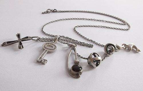 BIG DEAL !! ONE STERLING SILVER NECKLACE AND 8 DIFFERENT WAYS TO WEAR IT ....NICE ONE !!