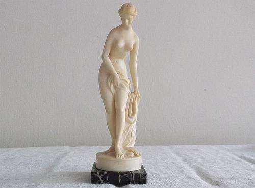 A BEAUTIFUL RESIN TYPE SEMI NUDE STATUE BY A.SANTINI SET ON A MARBLE BASE..MADE IN ITALY..LOVE IT !!