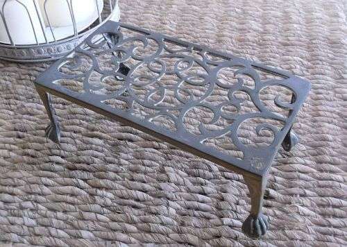 A RARE AND STUNNING VINTAGE / ANTIQUE TRIVET BY PEERAGE OF ENGLAND ....MUST SEE PIECE ...WOW !!!