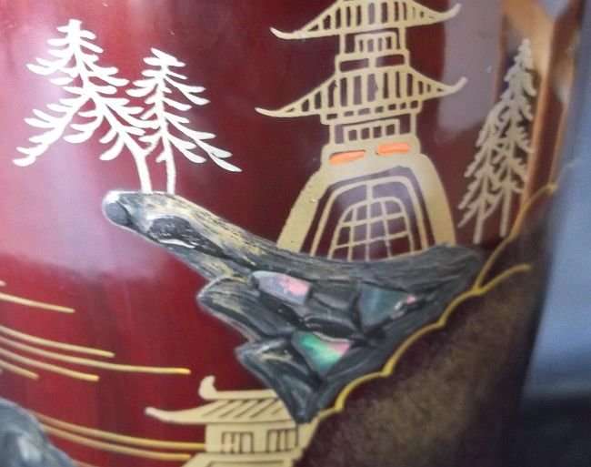 A VINTAGE JAPANESE VASE WITH ABALONE INLAY AND HAND PAINTED DETAIL OVER LACQUER / ENAMEL ?