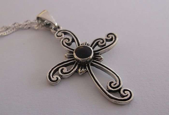 A STERLING SILVER NECKLACE PLUS A STERLING SILVER CROSS PENDANT...ONYX LOOK CENTER