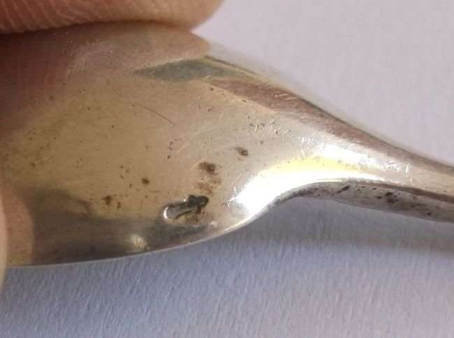 AN OLD DUTCH SILVER TEASPOON WITH THE LETTER ""A""
