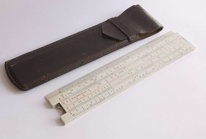 A COMPLICATED LOOKING VINTAGE A.W.FABER CASTELL SLIDE RULE IN LEATHER HOLDER ...COOL !!