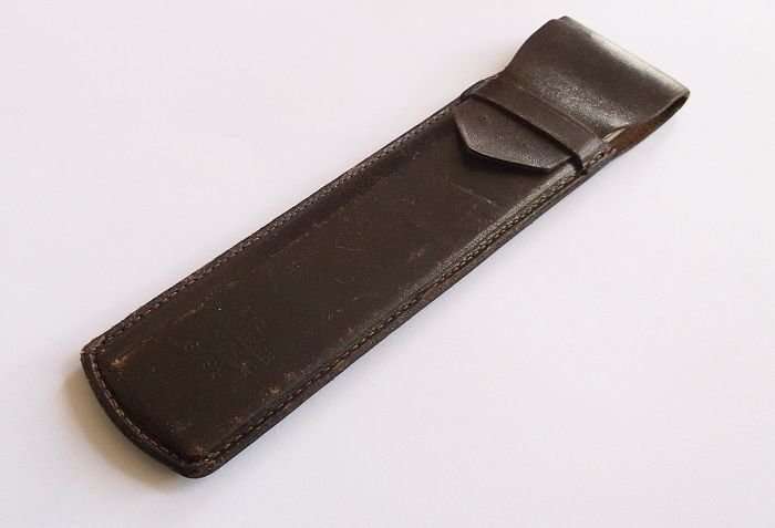 A COMPLICATED LOOKING VINTAGE A.W.FABER CASTELL SLIDE RULE IN LEATHER HOLDER ...COOL !!